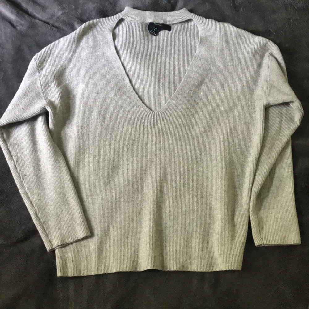 Super cute and comfy low v neck sweater.